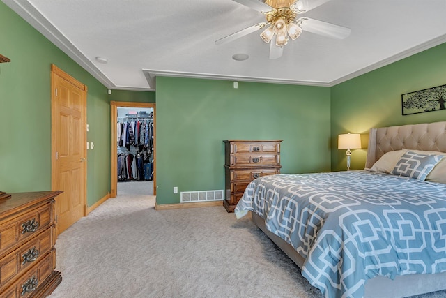 5386 165th St NE, Atwater, MN 56209 - bedroom with carpet, a spacious closet, a ceiling fan, baseboards, and a closet