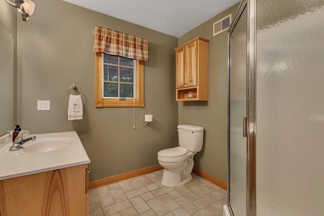 5386 165th St NE, Atwater, MN 56209 - bathroom with baseboards, toilet, vanity, and a shower stall