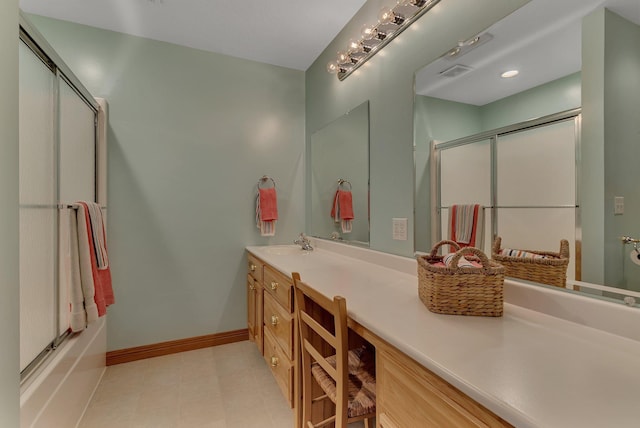 5386 165th St NE, Atwater, MN 56209 - full bathroom with double vanity, baseboards, and tile patterned floors