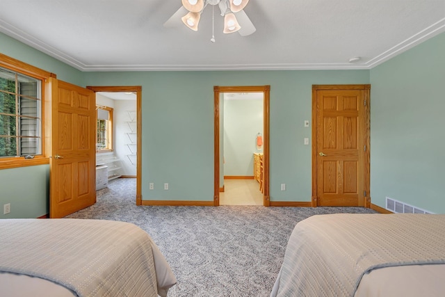 5386 165th St NE, Atwater, MN 56209 - bedroom featuring baseboards, carpet floors, connected bathroom, and ceiling fan