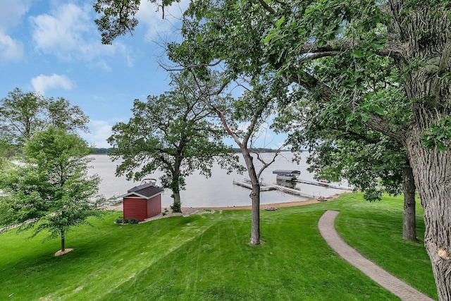5386 165th St NE, Atwater, MN 56209 - view of grassy yard with a water view and a dock
