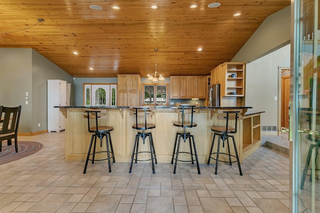 5386 165th St NE, Atwater, MN 56209 - kitchen with wood ceiling, open shelves, freestanding refrigerator, a kitchen bar, and recessed lighting
