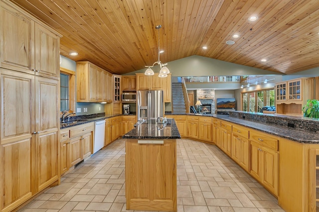 5386 165th St NE, Atwater, MN 56209 - kitchen featuring stainless steel appliances, lofted ceiling, a kitchen island with sink, wood ceiling, and glass insert cabinets