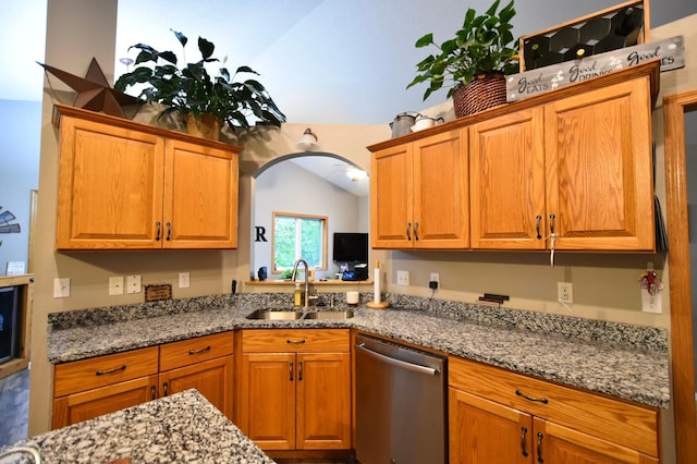 201 Ridge Dr, Kenyon, MN 55946 - kitchen featuring stainless steel dishwasher, a sink, vaulted ceiling, and stone counters