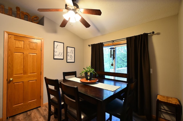 201 Ridge Dr, Kenyon, MN 55946 - dining area with vaulted ceiling, wood finished floors, and ceiling fan
