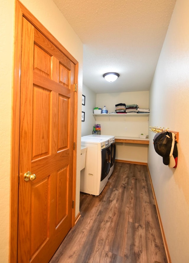 201 Ridge Dr, Kenyon, MN 55946 - laundry room featuring independent washer and dryer, dark wood finished floors, a textured ceiling, and baseboards