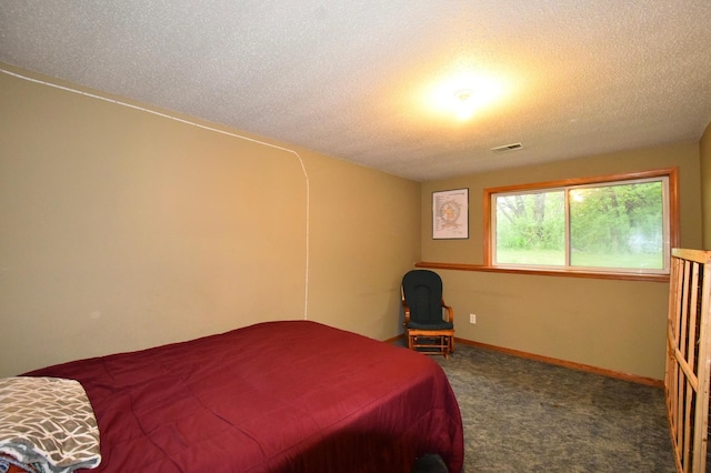 201 Ridge Dr, Kenyon, MN 55946 - bedroom featuring a textured ceiling and carpet
