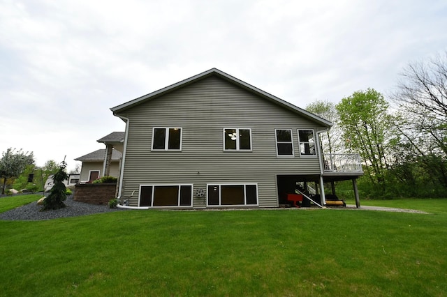 201 Ridge Dr, Kenyon, MN 55946 - rear view of property featuring a yard, stairs, and a deck