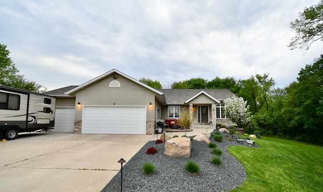 201 Ridge Dr, Kenyon, MN 55946 - single story home with an attached garage, a front lawn, concrete driveway, brick siding, and a shingled roof