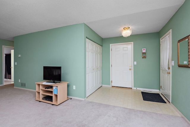 11023 57th St NE, Albertville, MN 55301 - carpeted foyer entrance featuring baseboards
