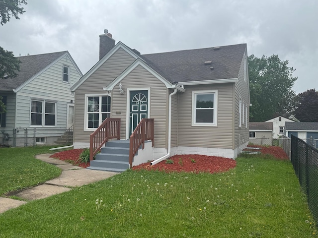 1465 White Bear Ave N, Saint Paul, MN 55106 - bungalow with a chimney and roof with shingles