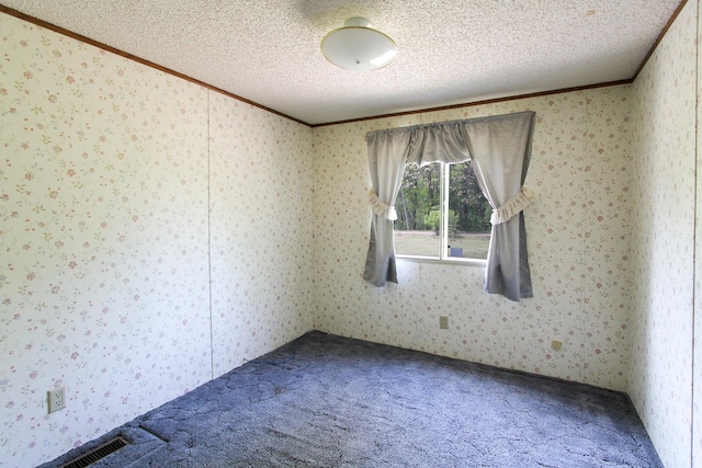 3146 Green Bay Rd, Sturgeon Lake, MN 55783 - carpeted empty room featuring ornamental molding, wallpapered walls, and a textured ceiling