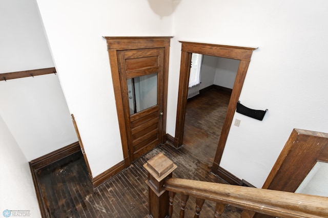 726 College St N, Fargo, ND 58102 - stairway featuring wood finished floors and baseboards