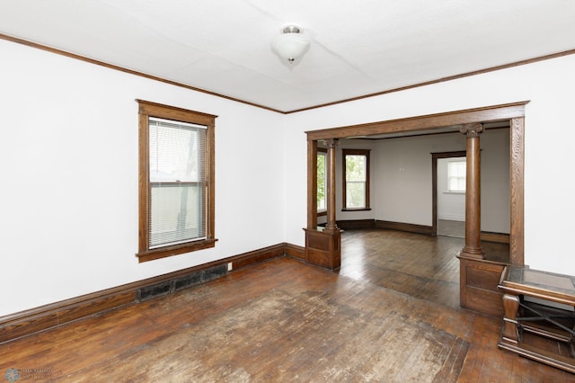 726 College St N, Fargo, ND 58102 - unfurnished room featuring ornamental molding, hardwood / wood-style floors, and baseboards