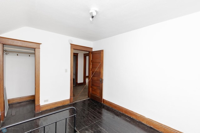 726 College St N, Fargo, ND 58102 - empty room with wood-type flooring and baseboards