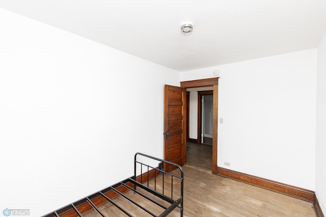 726 College St N, Fargo, ND 58102 - empty room featuring light wood finished floors and baseboards