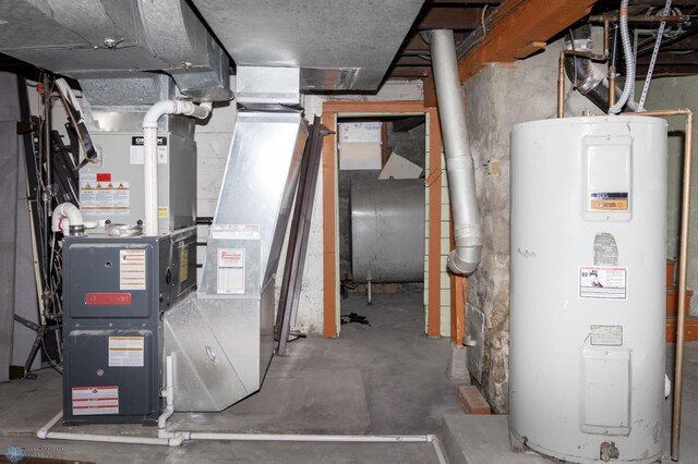 726 College St N, Fargo, ND 58102 - utility room with water heater and heating fuel