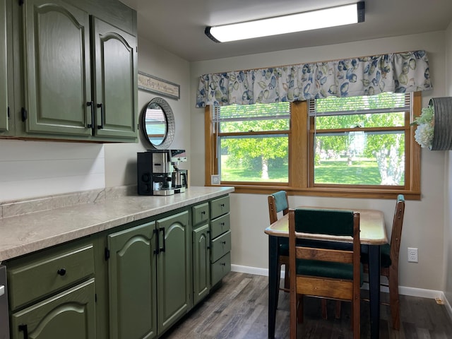 404 1st St S, Hoffman, MN 56339 - kitchen featuring green cabinets, dark wood-style flooring, and light countertops