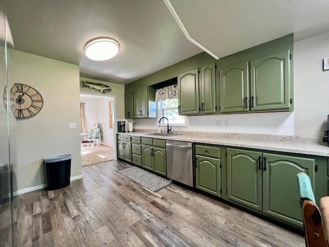 404 1st St S, Hoffman, MN 56339 - kitchen featuring green cabinets, stainless steel dishwasher, and a sink