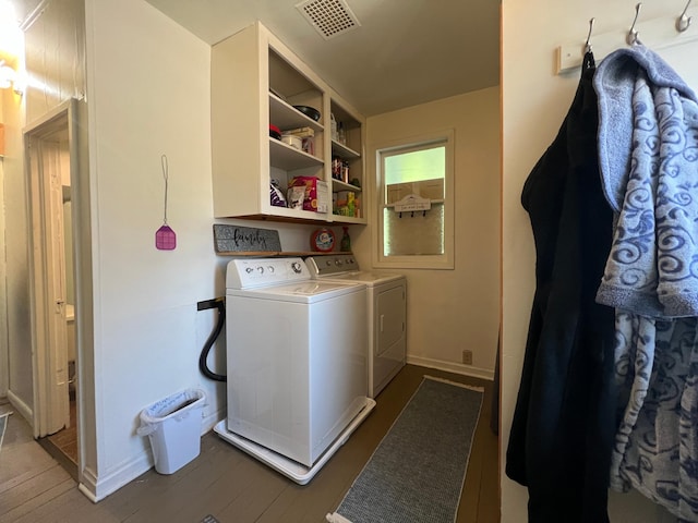 404 1st St S, Hoffman, MN 56339 - laundry area featuring washing machine and dryer, wood finished floors, and baseboards