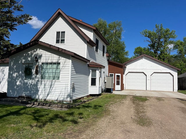 404 1st St S, Hoffman, MN 56339 - view of front of home with driveway and an outbuilding