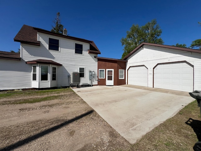 404 1st St S, Hoffman, MN 56339 - view of front of house featuring an outdoor structure and a chimney