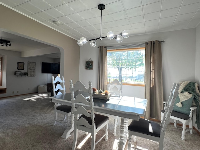 404 1st St S, Hoffman, MN 56339 - dining room with arched walkways and carpet flooring