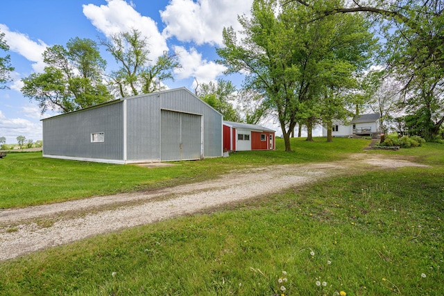 7149 92nd Ave SW, Lemond Twp, MN 56026 - detached garage featuring dirt driveway