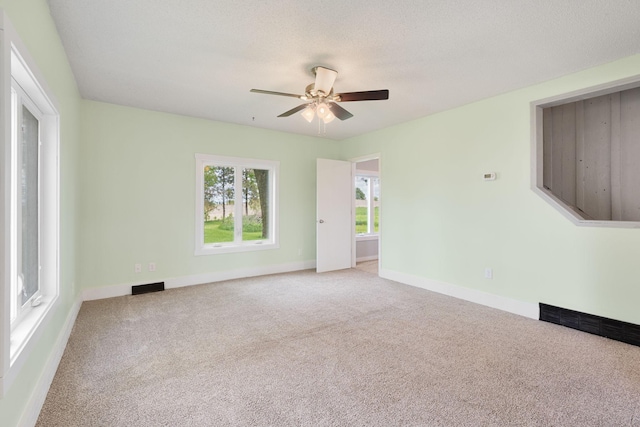 7149 92nd Ave SW, Lemond Twp, MN 56026 - carpeted spare room with ceiling fan and baseboards