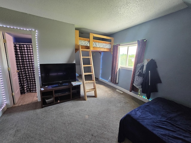 21824 County Highway 20, Lake Eunice Twp, MN 56501 - bedroom featuring a textured ceiling and carpet