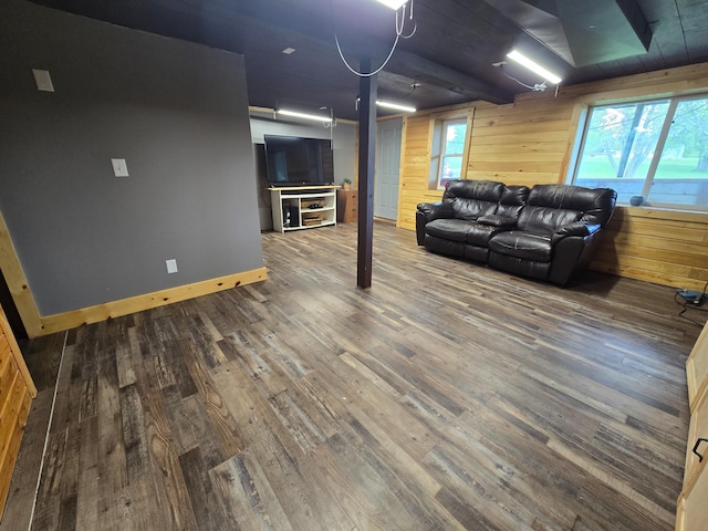 21824 County Highway 20, Lake Eunice Twp, MN 56501 - living area featuring wood finished floors, wood walls, and baseboards