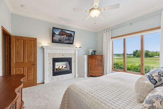 11565 Palisade Ct NE, Blaine, MN 55449 - bedroom featuring carpet, ornamental molding, a multi sided fireplace, and ceiling fan