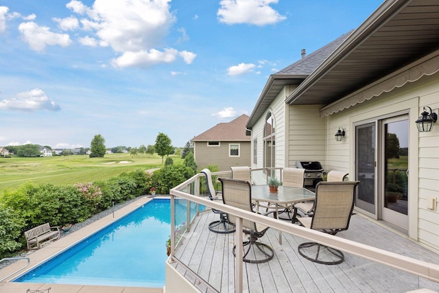 11565 Palisade Ct NE, Blaine, MN 55449 - outdoor pool featuring outdoor dining space, area for grilling, golf course view, and a wooden deck
