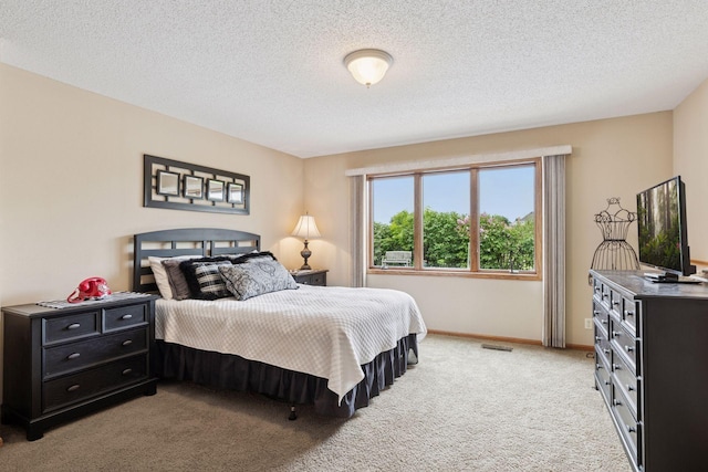 11565 Palisade Ct NE, Blaine, MN 55449 - bedroom with light carpet and a textured ceiling