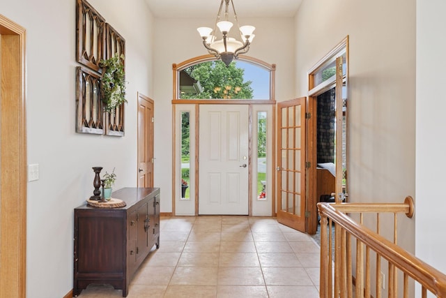 11565 Palisade Ct NE, Blaine, MN 55449 - foyer featuring a chandelier and light tile patterned floors