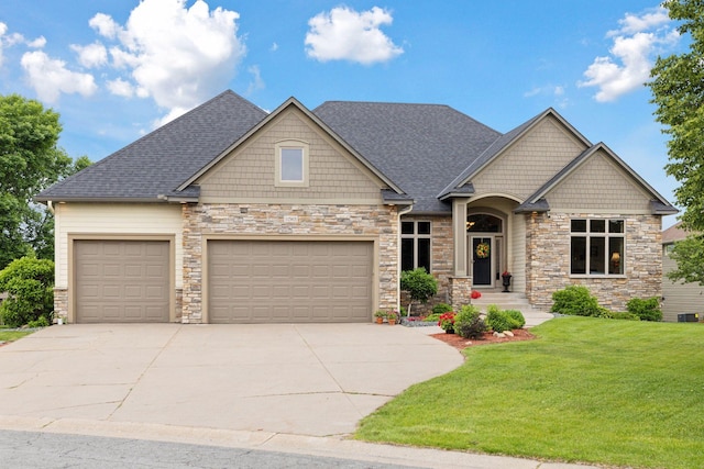 11565 Palisade Ct NE, Blaine, MN 55449 - craftsman house with a garage, concrete driveway, a front lawn, stone siding, and a shingled roof