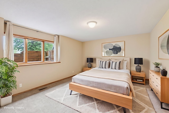 11565 Palisade Ct NE, Blaine, MN 55449 - bedroom featuring light carpet and baseboards
