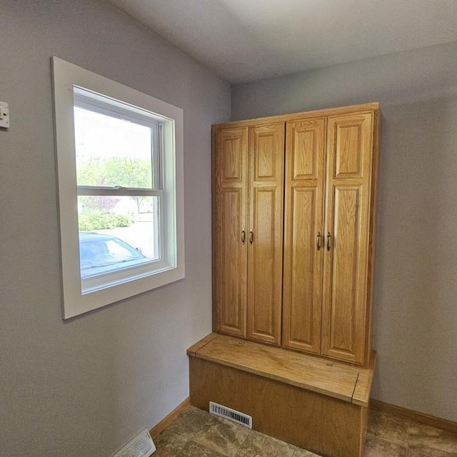 410 9th St, Morris, MN 56267 - mudroom featuring baseboards