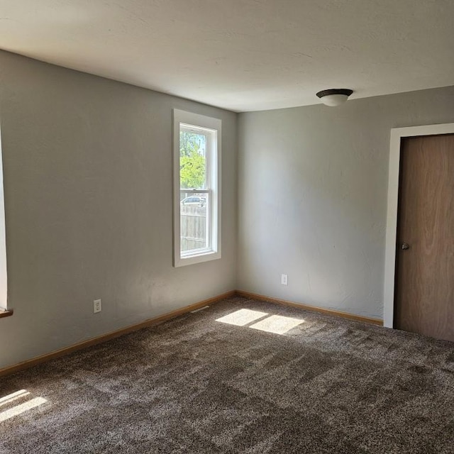 410 9th St, Morris, MN 56267 - carpeted spare room with baseboards