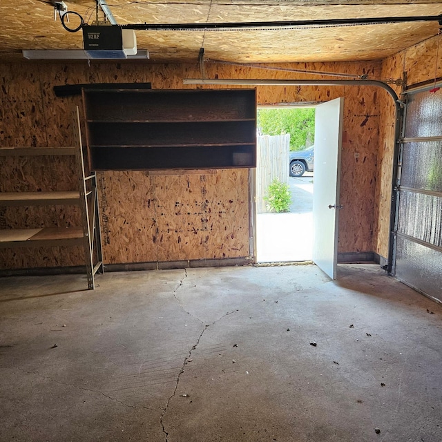 410 9th St, Morris, MN 56267 - garage featuring a garage door opener
