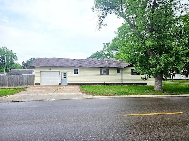 410 9th St, Morris, MN 56267 - view of front of property featuring a garage and driveway