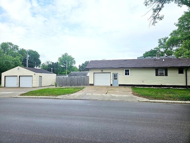 410 9th St, Morris, MN 56267 - view of front facade featuring a garage