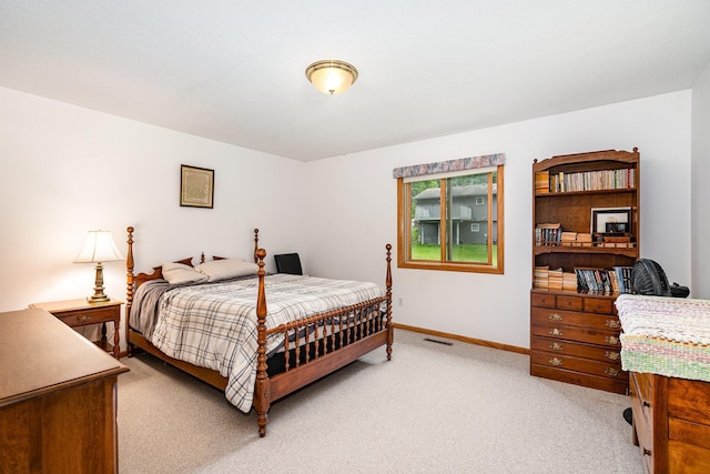 324 7th St NE, New Prague, MN 56071 - bedroom featuring light carpet and baseboards