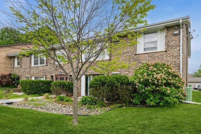 811 Smetana Rd Unit 8, Hopkins, MN 55343 - view of front of home with brick siding and a front yard