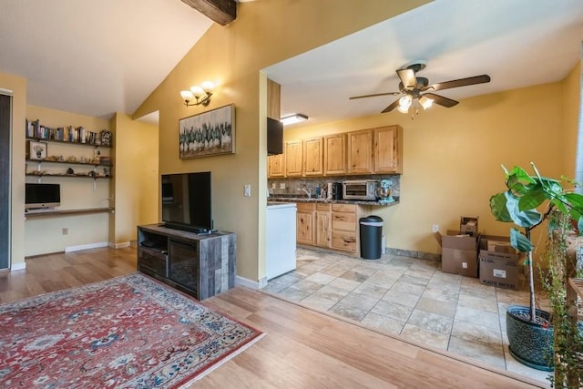 811 Smetana Rd Unit 8, Hopkins, MN 55343 - kitchen with ceiling fan, light wood finished floors, decorative backsplash, baseboards, and dark countertops