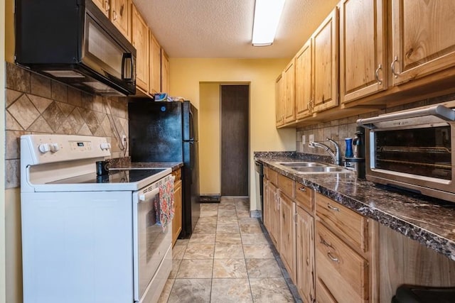 811 Smetana Rd Unit 8, Hopkins, MN 55343 - kitchen featuring black appliances, a sink, dark countertops, backsplash, and a textured ceiling