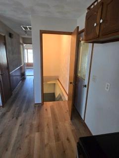 405 16th Ave NE, Waseca, MN 56093 - corridor with wood finished floors