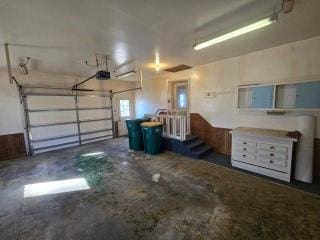 405 16th Ave NE, Waseca, MN 56093 - garage featuring a garage door opener