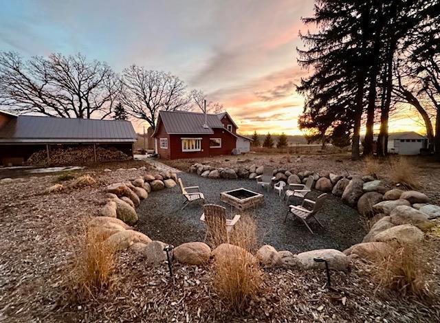 40580 Bow Trl, Nerstrand, MN 55053 - view of yard at dusk