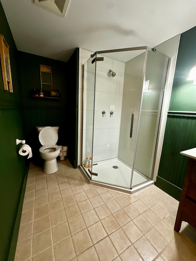 40580 Bow Trl, Nerstrand, MN 55053 - full bath featuring tile patterned floors, a shower stall, wainscoting, and vanity